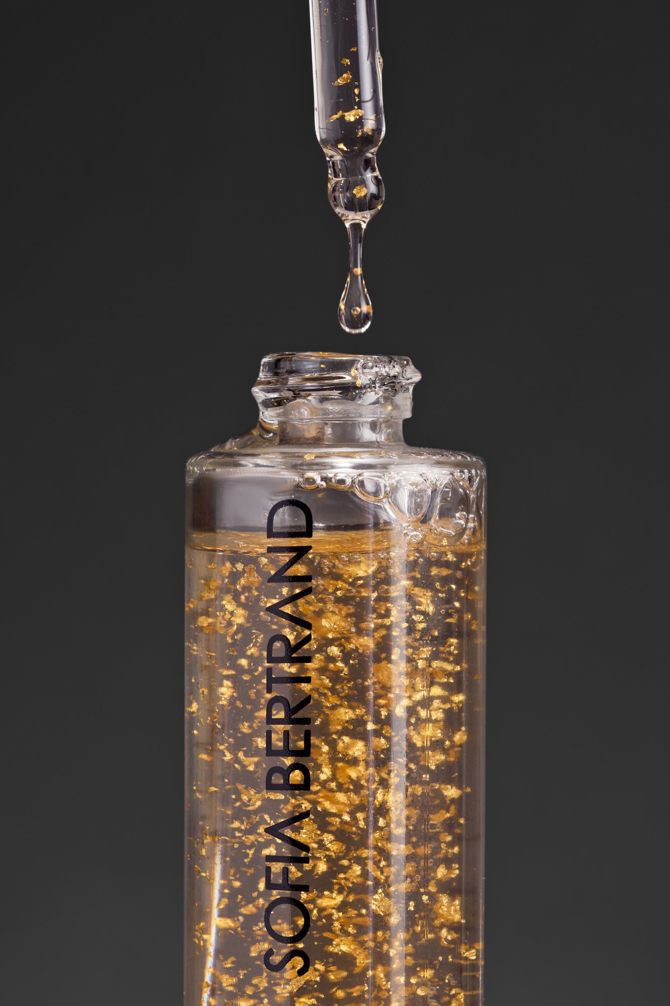 304 SUBLIME YOUTH 24K ELIXIR + BELISSE TOILETRY BAG